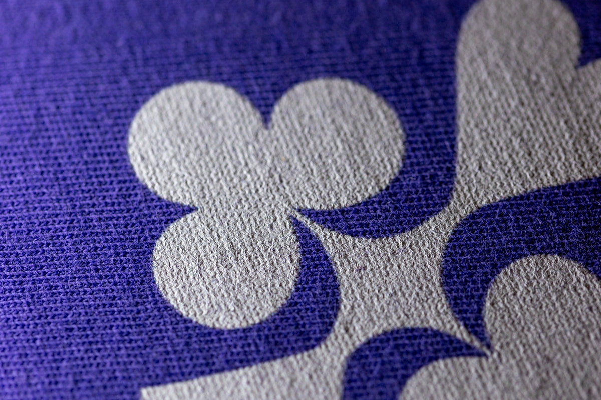 Macro suit graphic detail on purple NO ONE CARES WHAT YOU FOLDED poker T-shirt